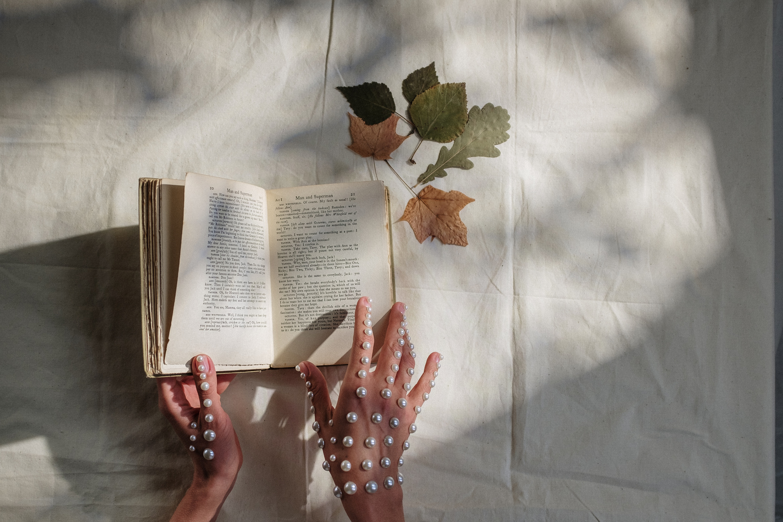 Person Holding White Book Page